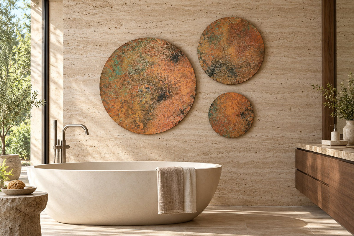 Copper Orbit Mystic Copper Nebula – round copper wall art set of 3 on a travertine wall above a freestanding stone bathtub, room visualization